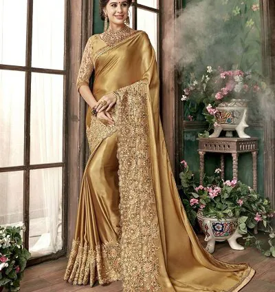 Golden embroidered silk saree